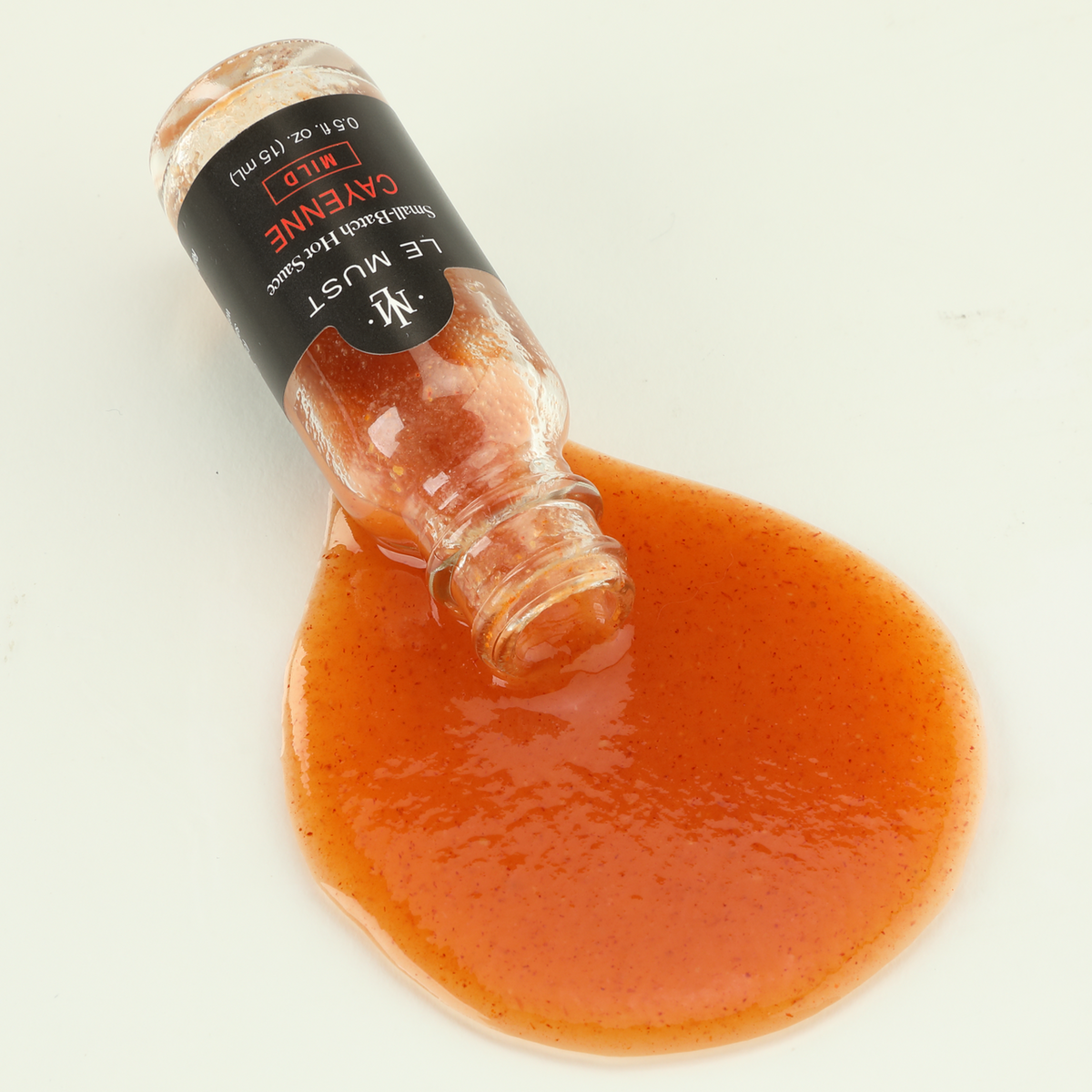 Le Must Cayenne Hot Sauce, 15 ml, poured sauce
