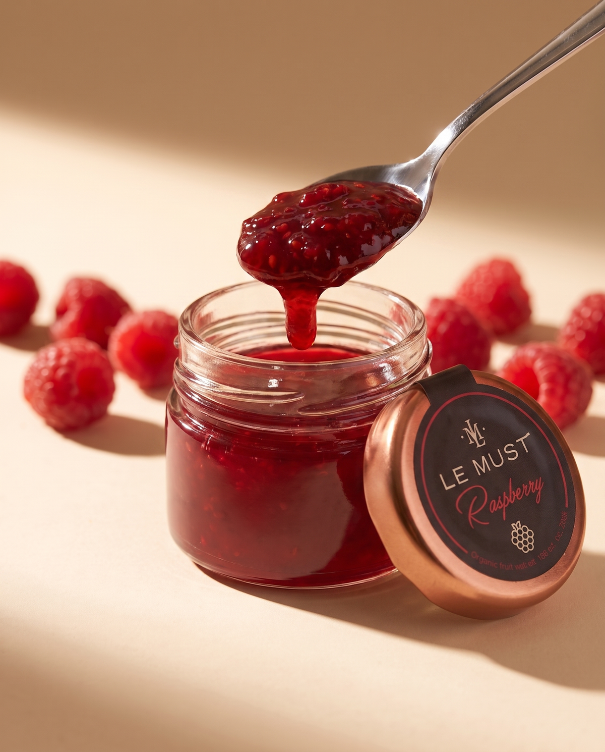 Le Must Premium Organic Raspberry Jam, 30 grams, open jar