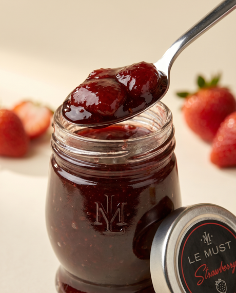 Le Must Deluxe Organic Strawberry Jam, 45 grams, with a spoon