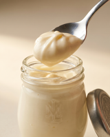 Le Must Deluxe Organic Mayonnaise, 44 grams, with a spoon