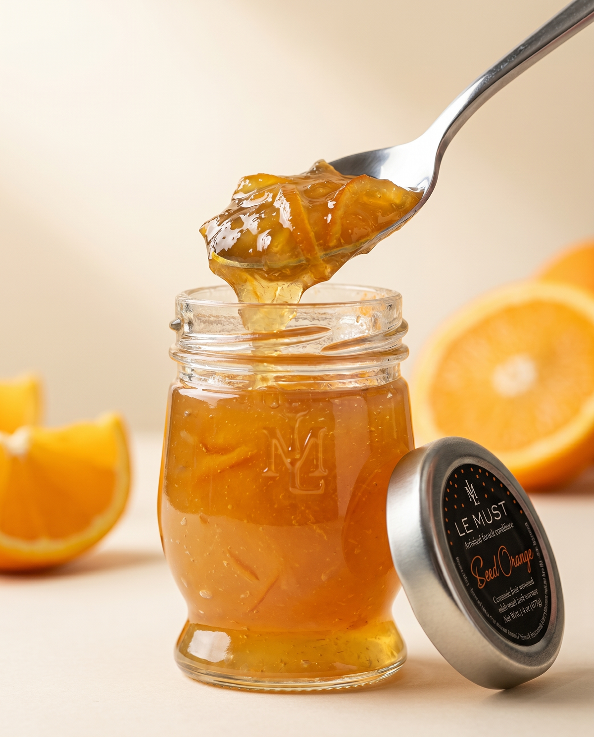 Le Must Deluxe Organic Orange Marmalade, 45 grams, with a spoon